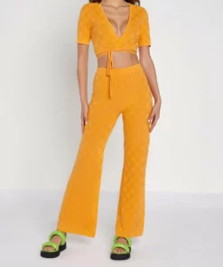 Another Girl Checkerboard Wrapover Crop Top in Orange - women